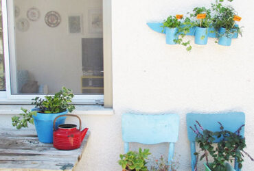 DIY: כך תכינו מעמד עציצים מקופסאות פח ישנות