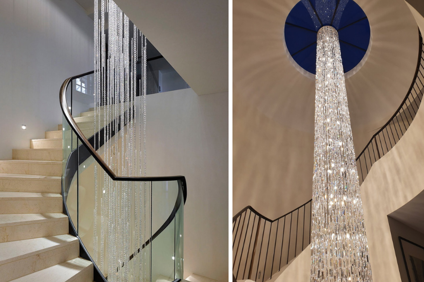 נברשות קריסטל, גרם מדרגות מעוגל עם מעקה זכוכית ונברשת קריסטלים גבוהה ומרשימה המשתלשלת מחלל כפול בגג כיפה.