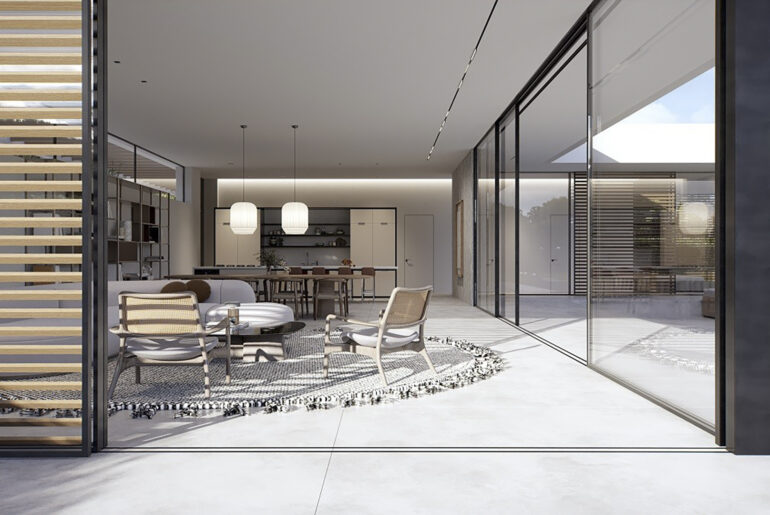 חלונות זכוכית גדולים מהרצפה עד התקרה עם מסגרות אלומיניום שחורות המחברים בין סלון מודרני לחצר פתוחה